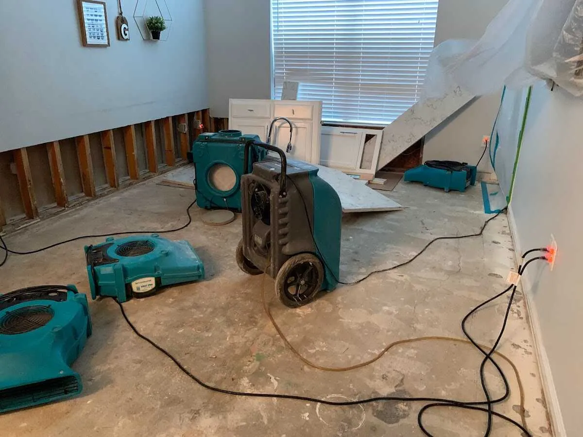 Dehumidifier in flood-cut room for Water Damage Restoration in Grayslake